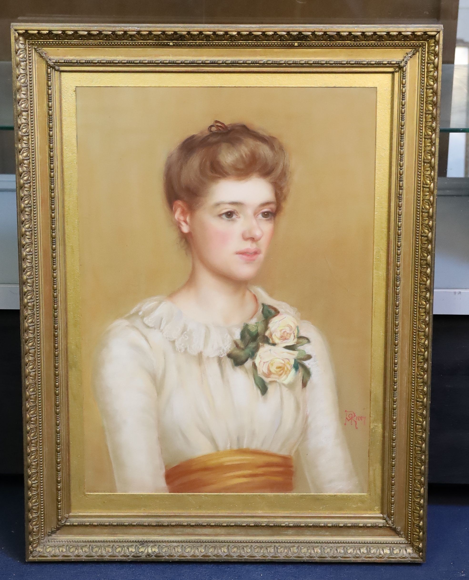 MRG 1887, Portrait of a young lady wearing a rose corsage, pastel, 64 x 45cm